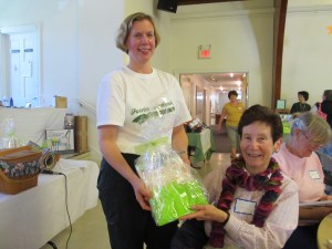 Susan presenting Sue with a door prize!