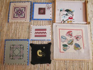 Top:  Carol's SOTM, Rosie's Journey, Diane's Stocking Middle:  Sue C's Christmas Cracker Bottom:  Carol's Lilac Time, Carol's Ram, Diane's Tea Cups!